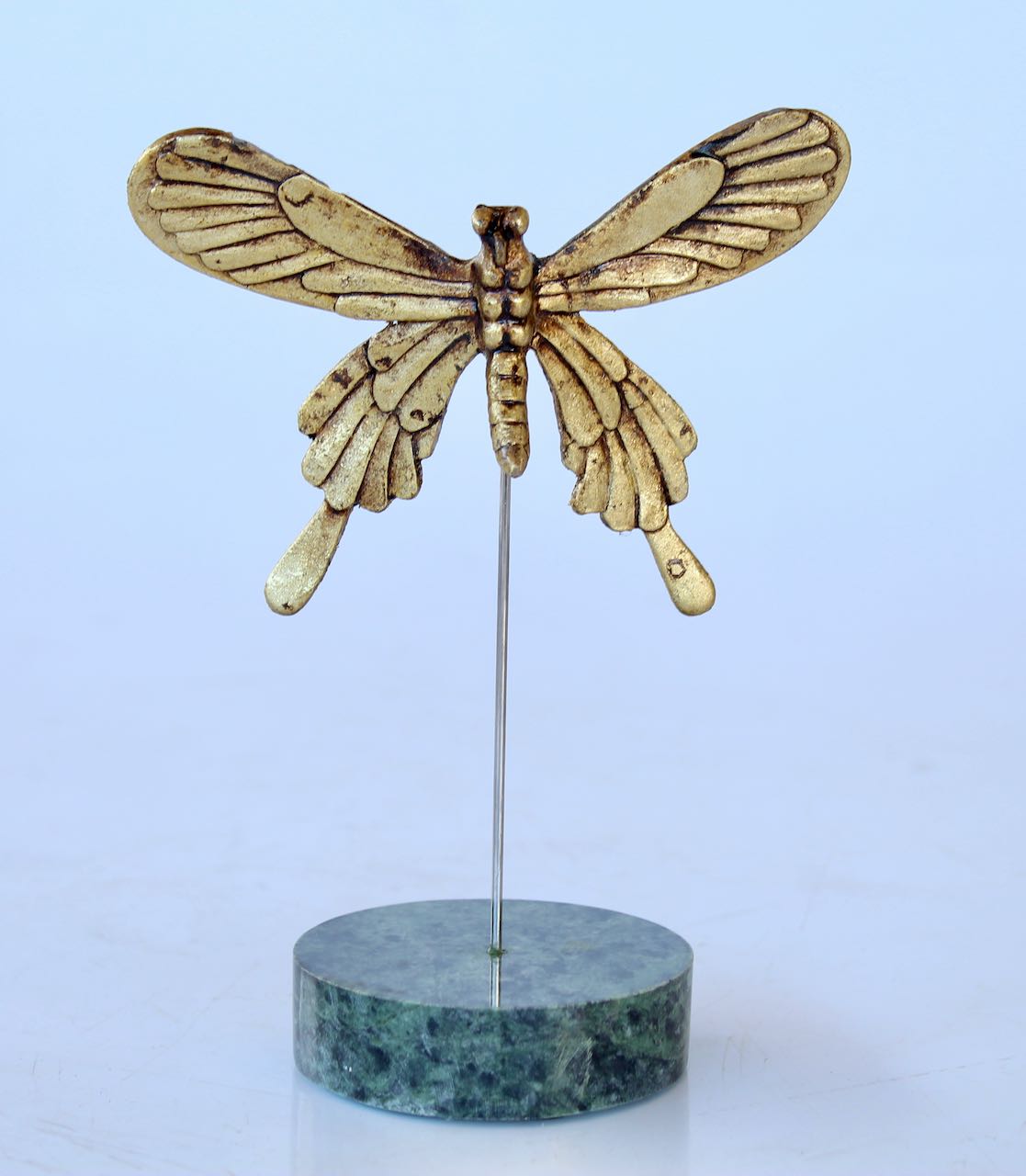 Gold Butterfly On Green Marble Stand
