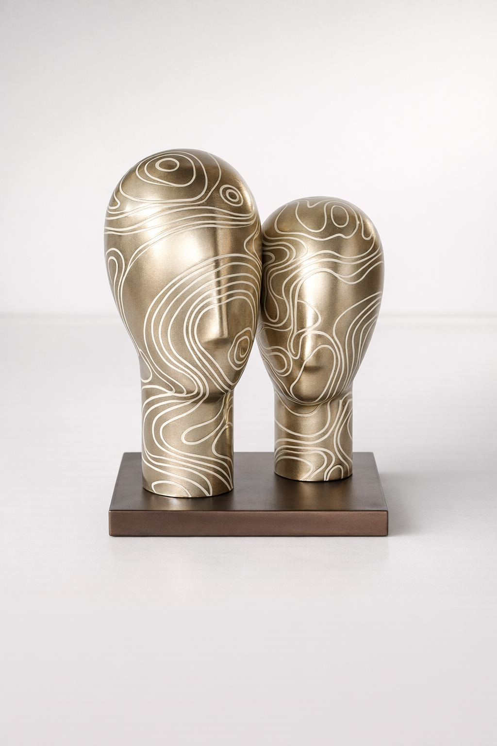2 Silver Heads On Stand