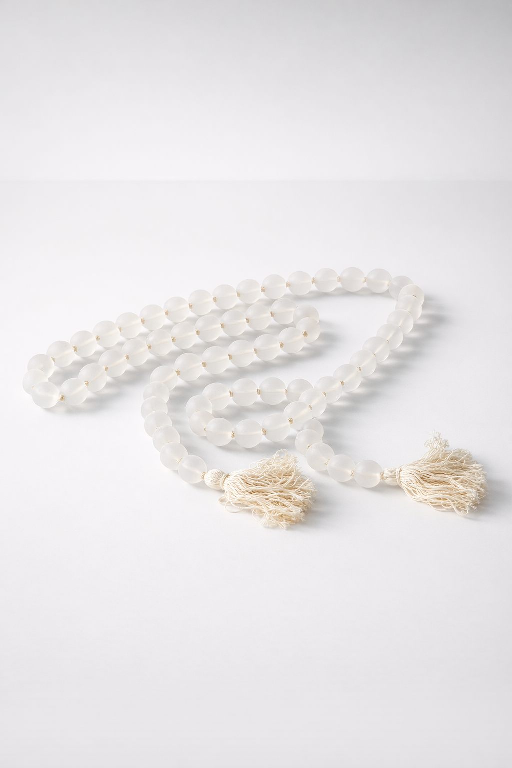 String Of White Opaque Resin Beads