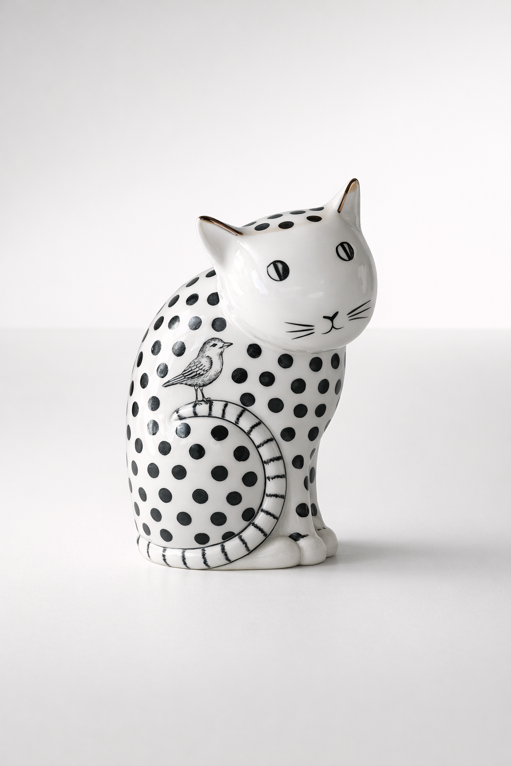 Black & White Spotted Ceramic Cat With Bird