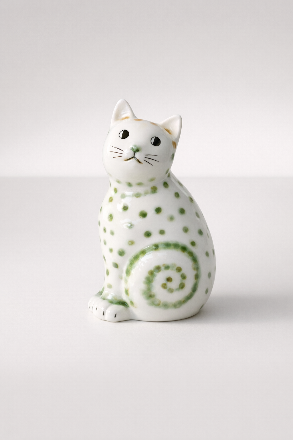 Green & White Spotted Ceramic Cat Curly Tail