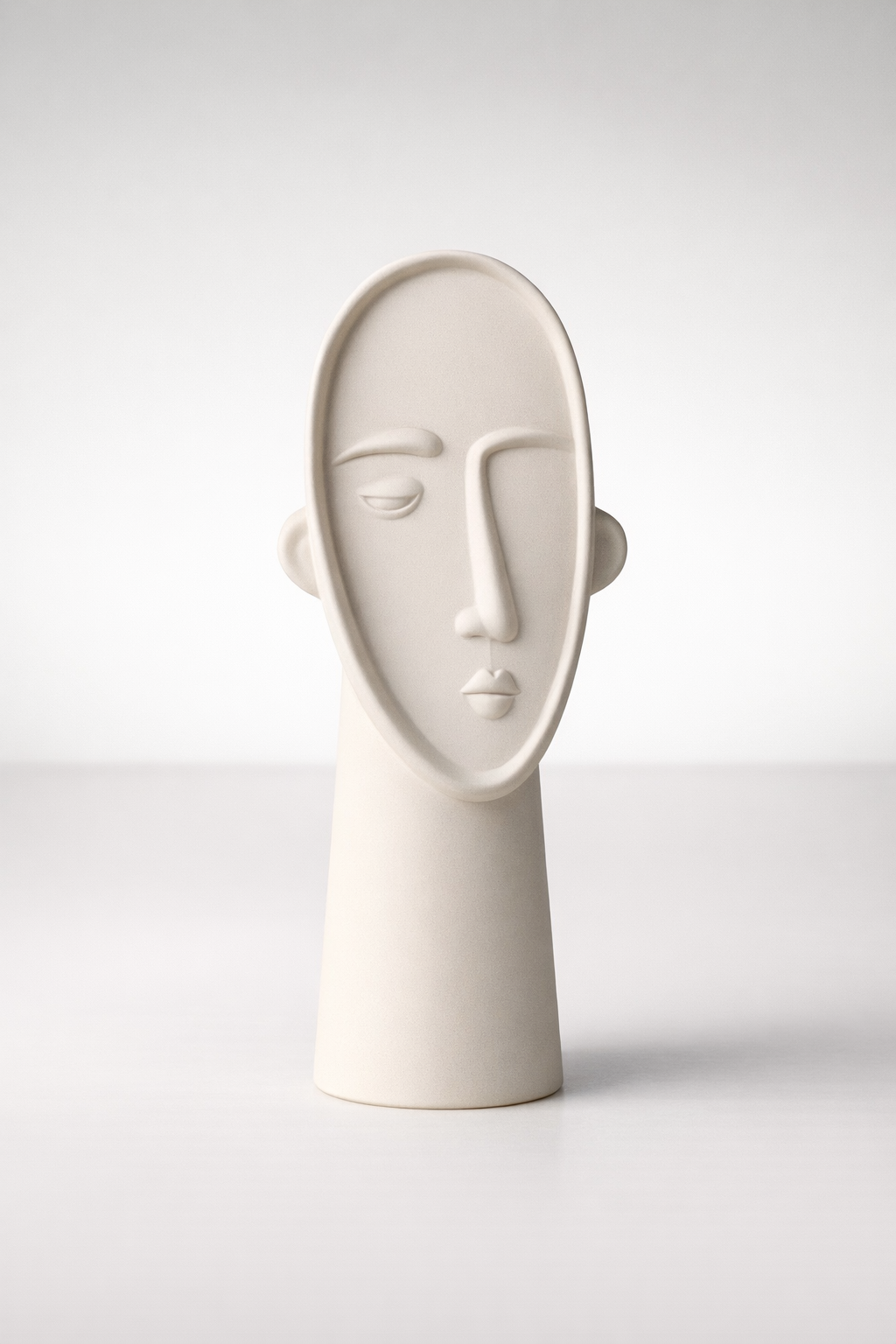 Tall White Ceramic Face Vase